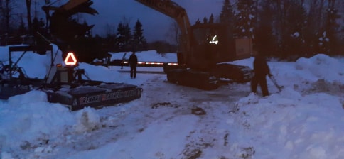 The night sets in as we trailered up the drag/sled that is pulled behind the groomer.